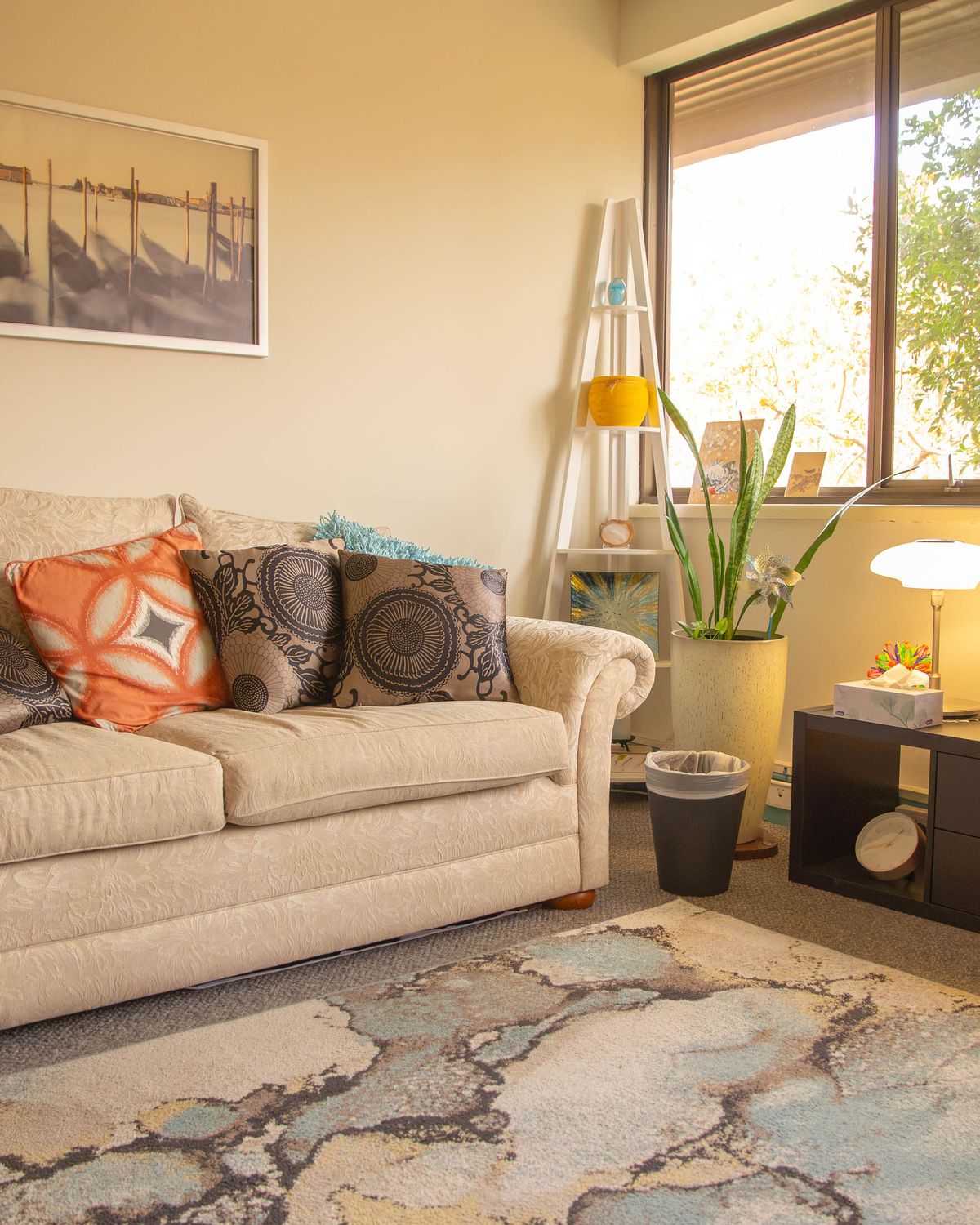 A sofa by the window in the West Perth consulting room